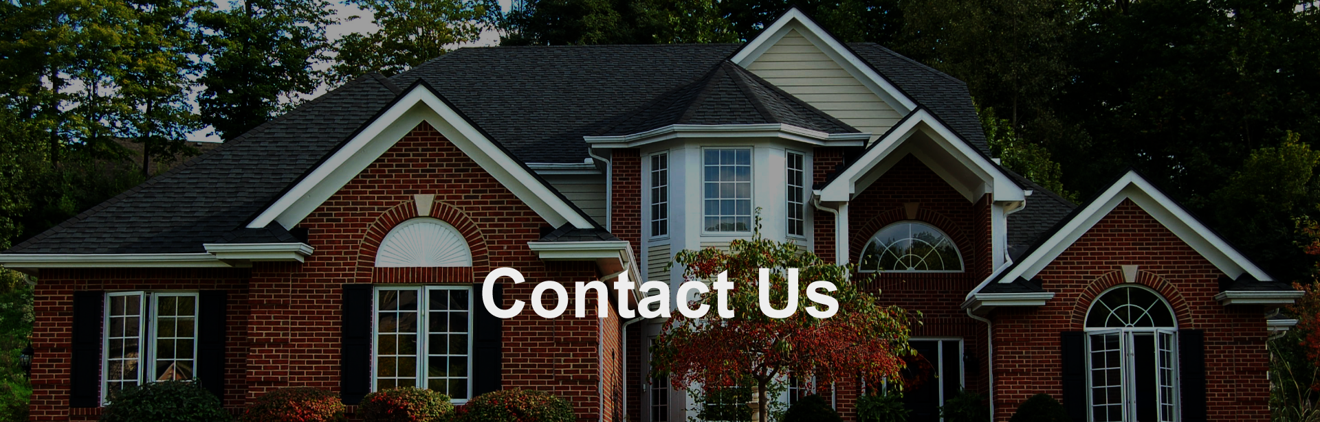 Contact Us: A photograph of a home with a beautiful roof.